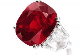 The Sunrise Ruby - 25ct Unheated Natural Burma Ruby with Pigeon Blood Color Mounted in a Cartier Ring The Sunrise Ruby - 25ct Unheated Natural Burma Ruby with Pigeon Blood Color Mounted in a Cartier Ring